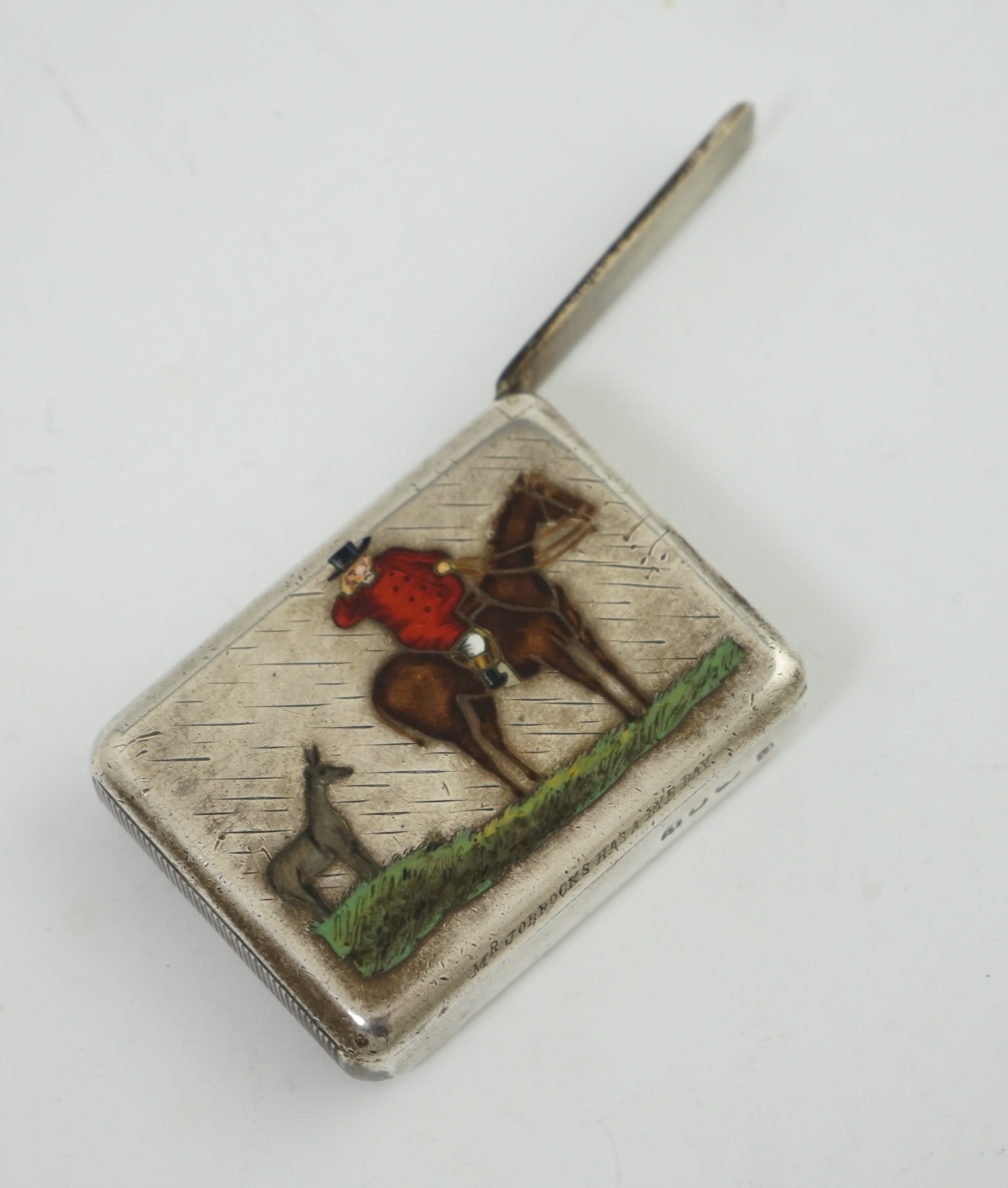 A late Victorian silver and enamel vesta case, by Edmonds & Johnson, Inscribed 'Mr Jorroks has a bye day'